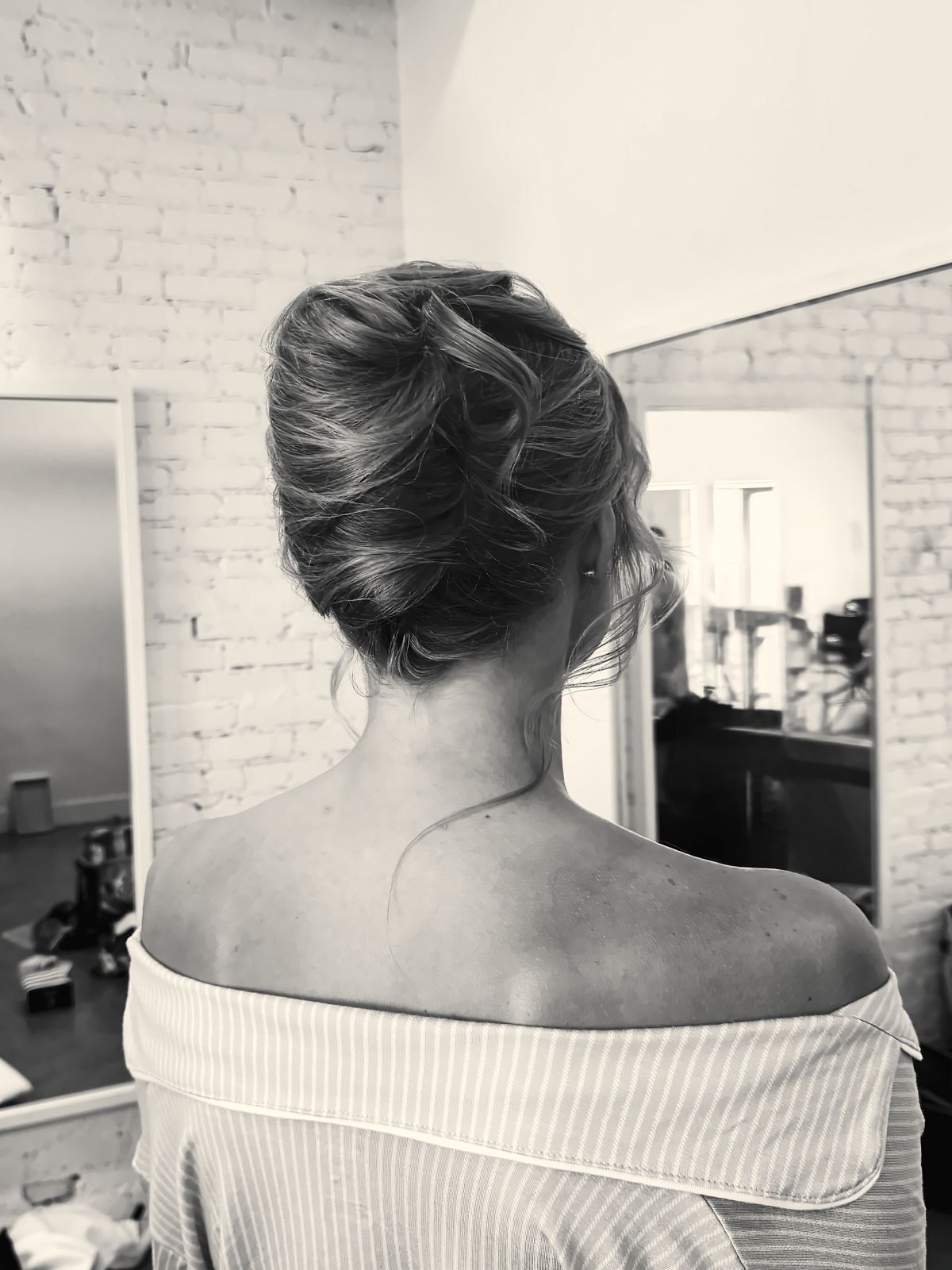 Soft, textured bridal updo styled by The Updo Queen