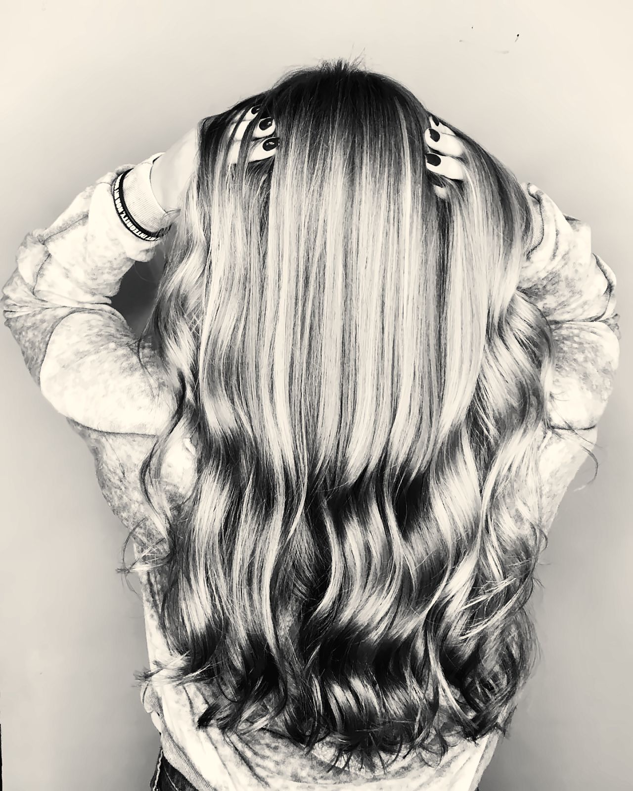 Glossy, bouncy blowout with soft waves
